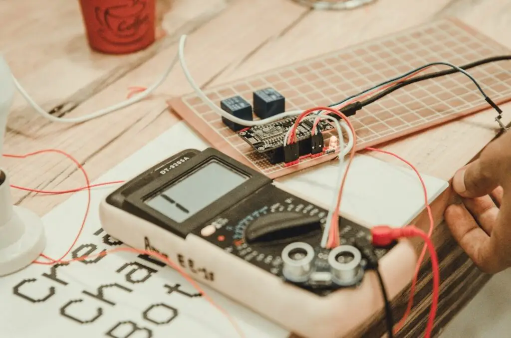 A homeowner using a digital multimeter to test a circuit - electrical repairs