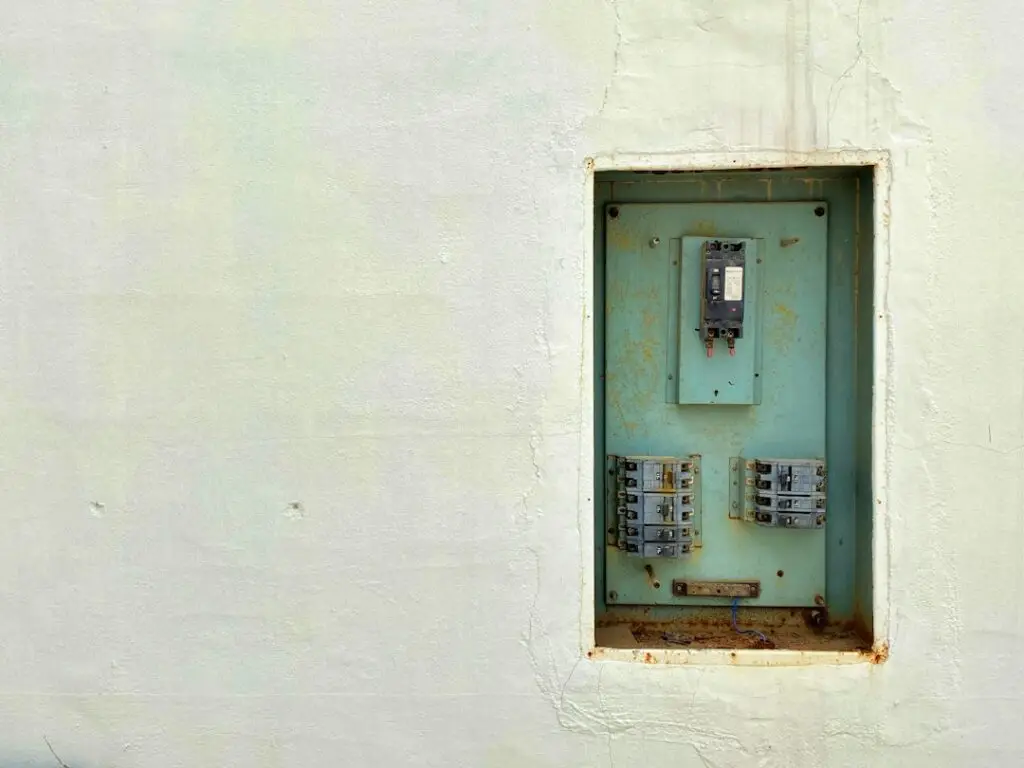 An older or outdated electrical panel needing replacement