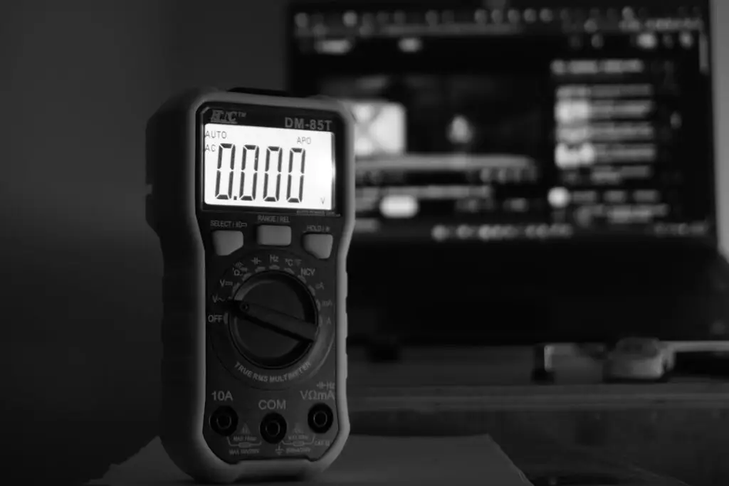 digital multimeter testing an outlet