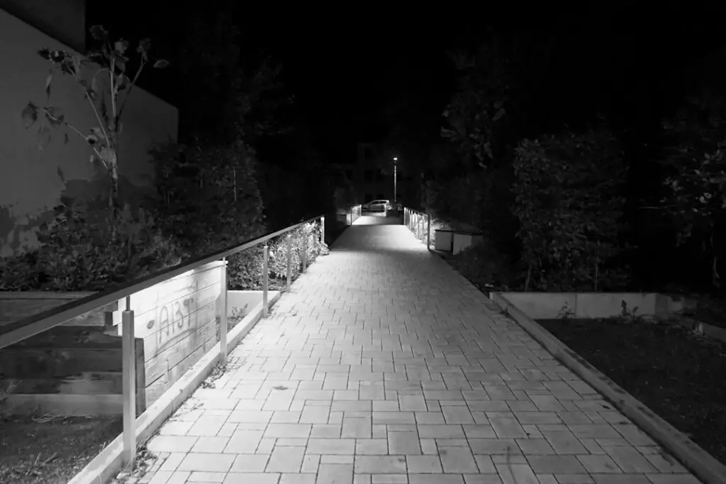 Pathway lighting leading to a front door safely guiding guests