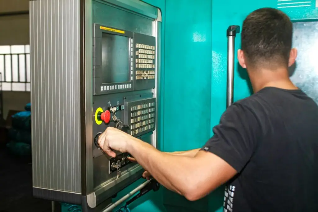 Technician performing generator maintenance